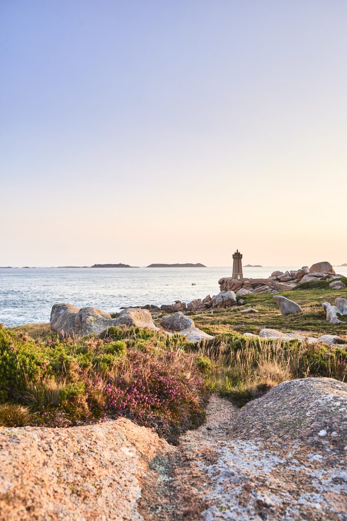 Summer sunset over Mean Ruz lighthouse in Ploumanac'h in Perros-Guirec